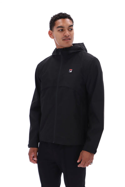 Displays a model wearing the Black 'FILA' branded Marcos Full Zip Jacket