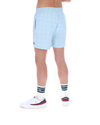 Light blue shorts worn by a person on a white background