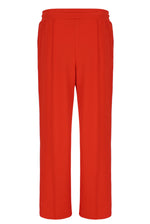 Orange sweatpants on a white background