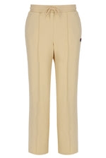 Beige pants with a drawstring on a white background