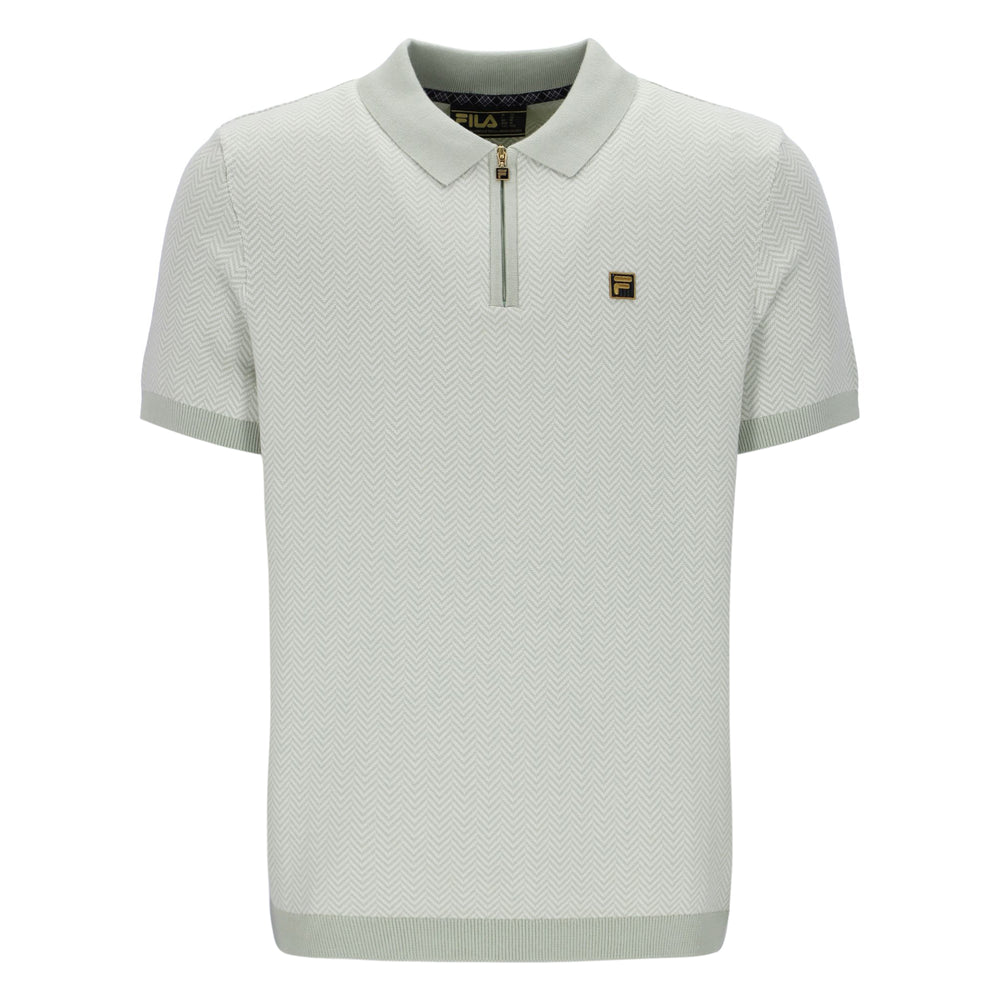 Light green polo shirt with a brand logo on a white background