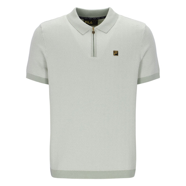 Light green polo shirt with a brand logo on a white background