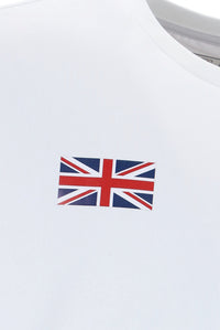 White tennis t-shirt with cap sleeves, featuring the FILA logo and a Union Jack flag patch on the chest.