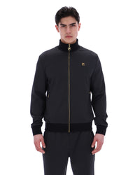 Displays a model wearing the Black 'FILA' branded Mathers Herringbone Track Top