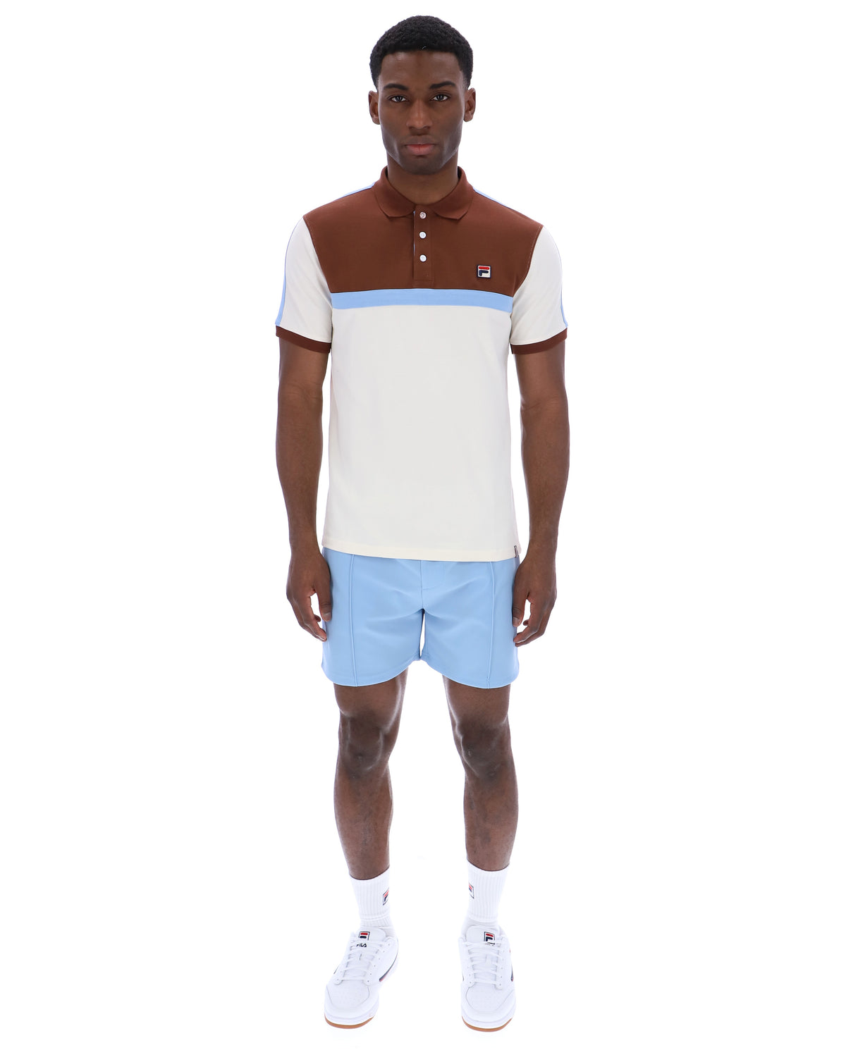 Displays a model wearing the Gardenia Mattia 'FILA' branded Contrast Panel Polo Shirt
