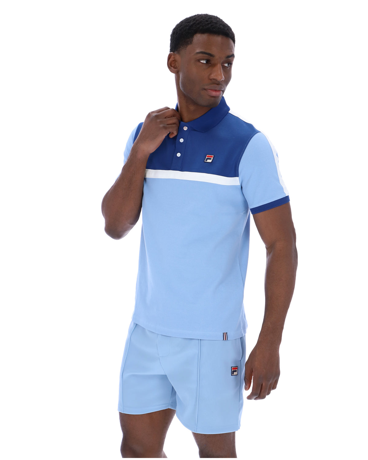 Displays a model wearing the Frozen Fjord 'FILA' branded Mattia Contrast Panel Polo Shirt