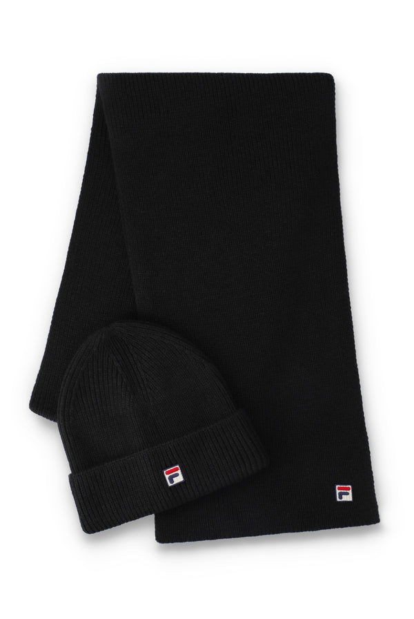 Black FILA knitted beanie hat and matching black knitted scarf set with embroidered FILA logo detailing, displayed on a light grey background.