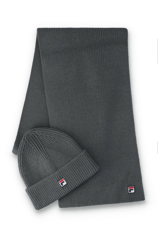 A dark gray ribbed knit beanie and matching scarf set from Fila, displayed on a clean white background.