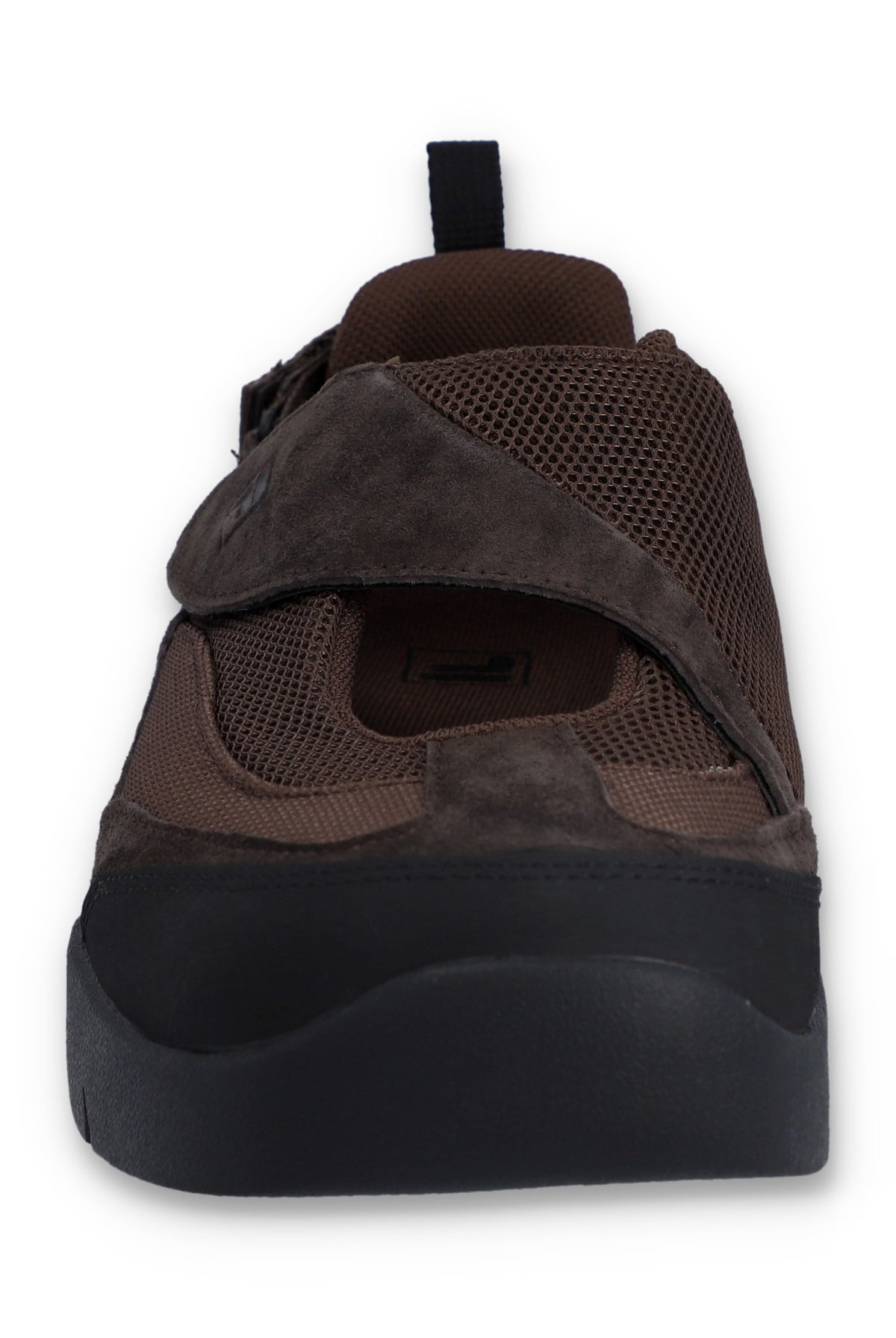 Brown flat shoe with a strap on a white background
