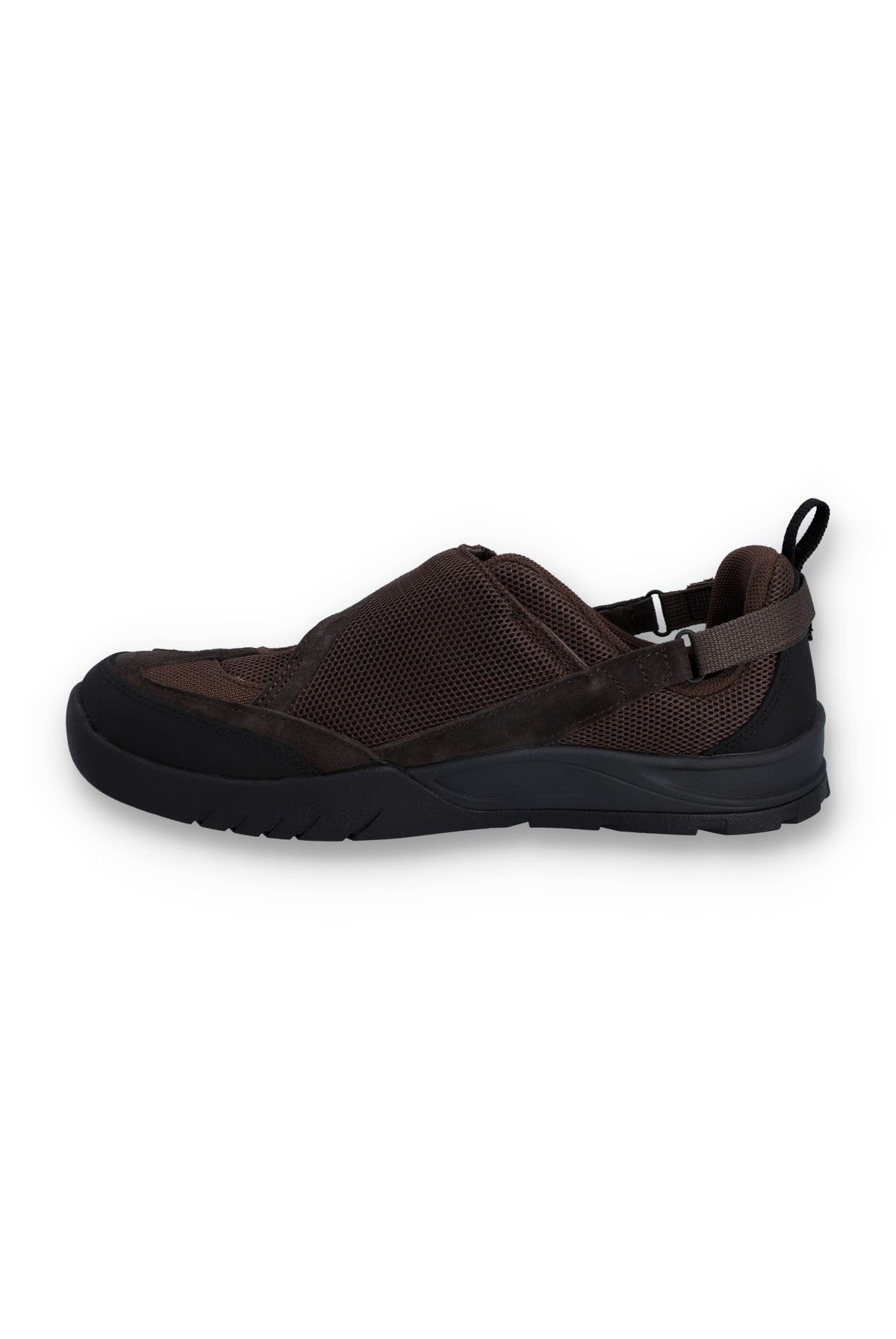 Brown flat shoe with a strap on a white background