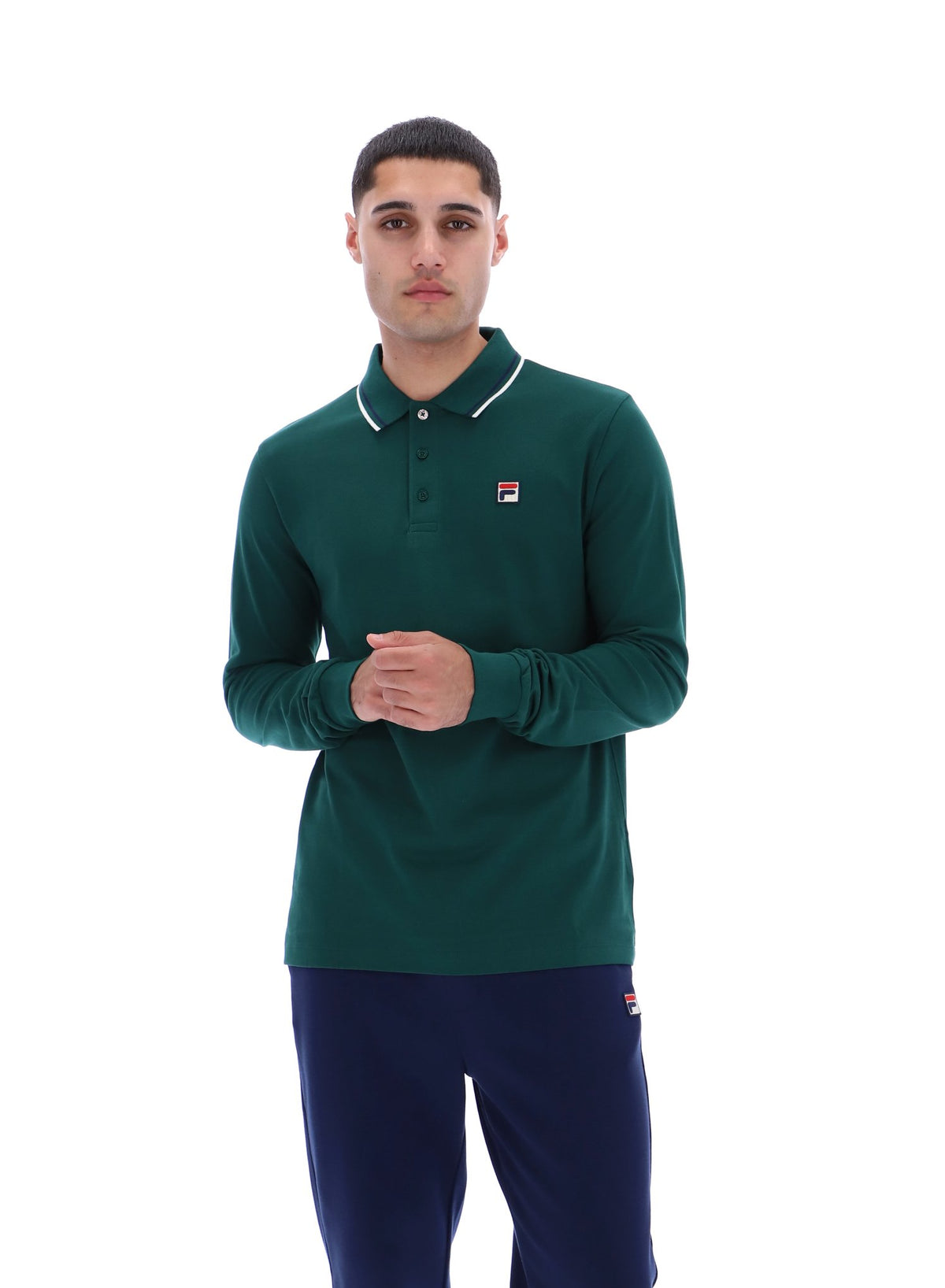 Displays a model wearing the Rain Forest Monte 'FILA' branded Tipped Collar Long Sleeve Polo
