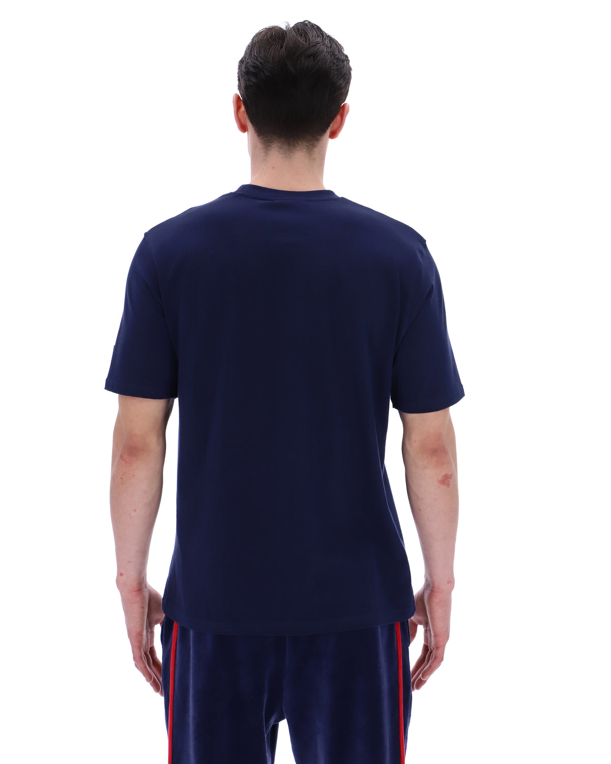 Man wearing a navy blue t-shirt on a white background