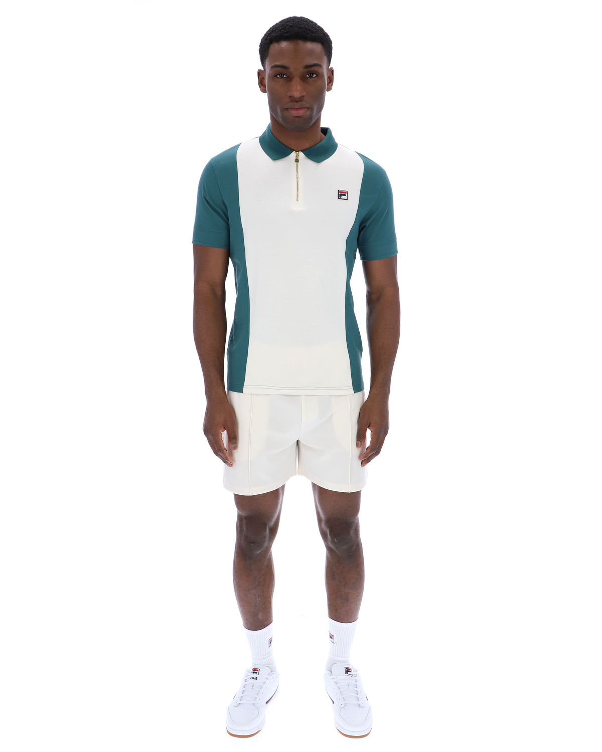 Displays a model wearing the Mediterranea 'FILA' branded Pierro Zip Up Polo