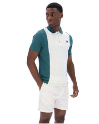 Displays a model wearing the Mediterranea 'FILA' branded Pierro Zip Up Polo