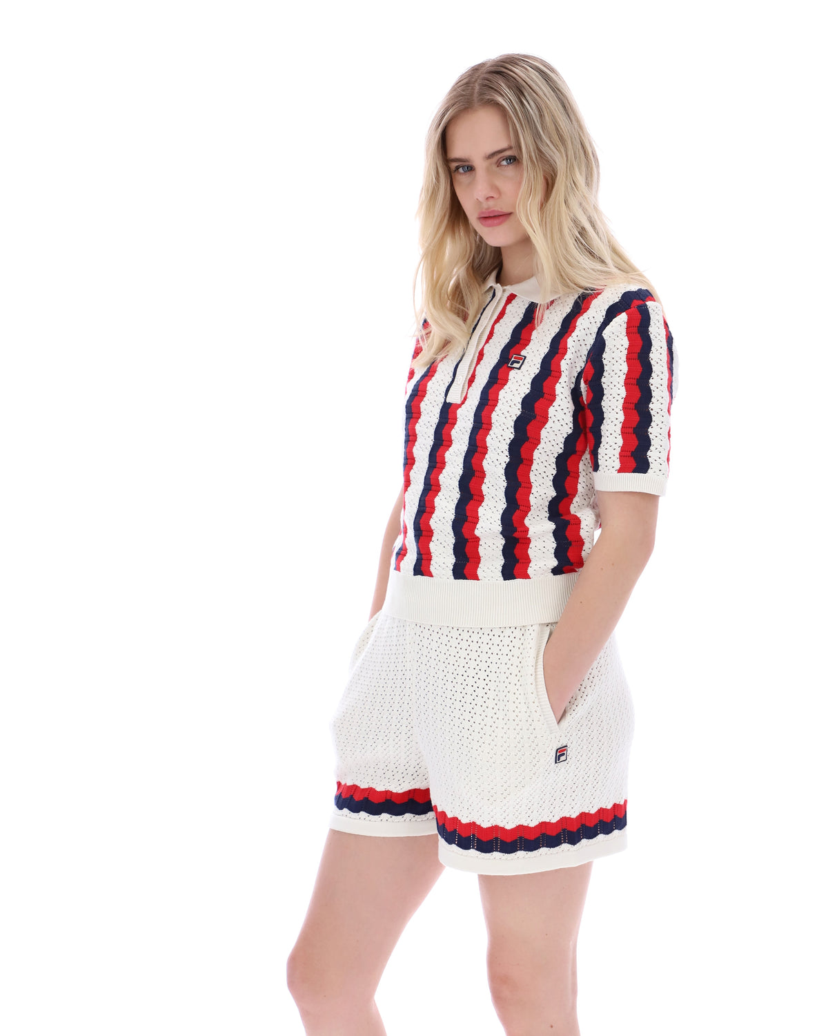 Displays a model wearing the Porto 'Fila' branded Knitted Crochet Stripe Polo