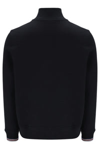Displays a model wearing Black 'FILA' branded Ramy F-Box 1/4 Zip