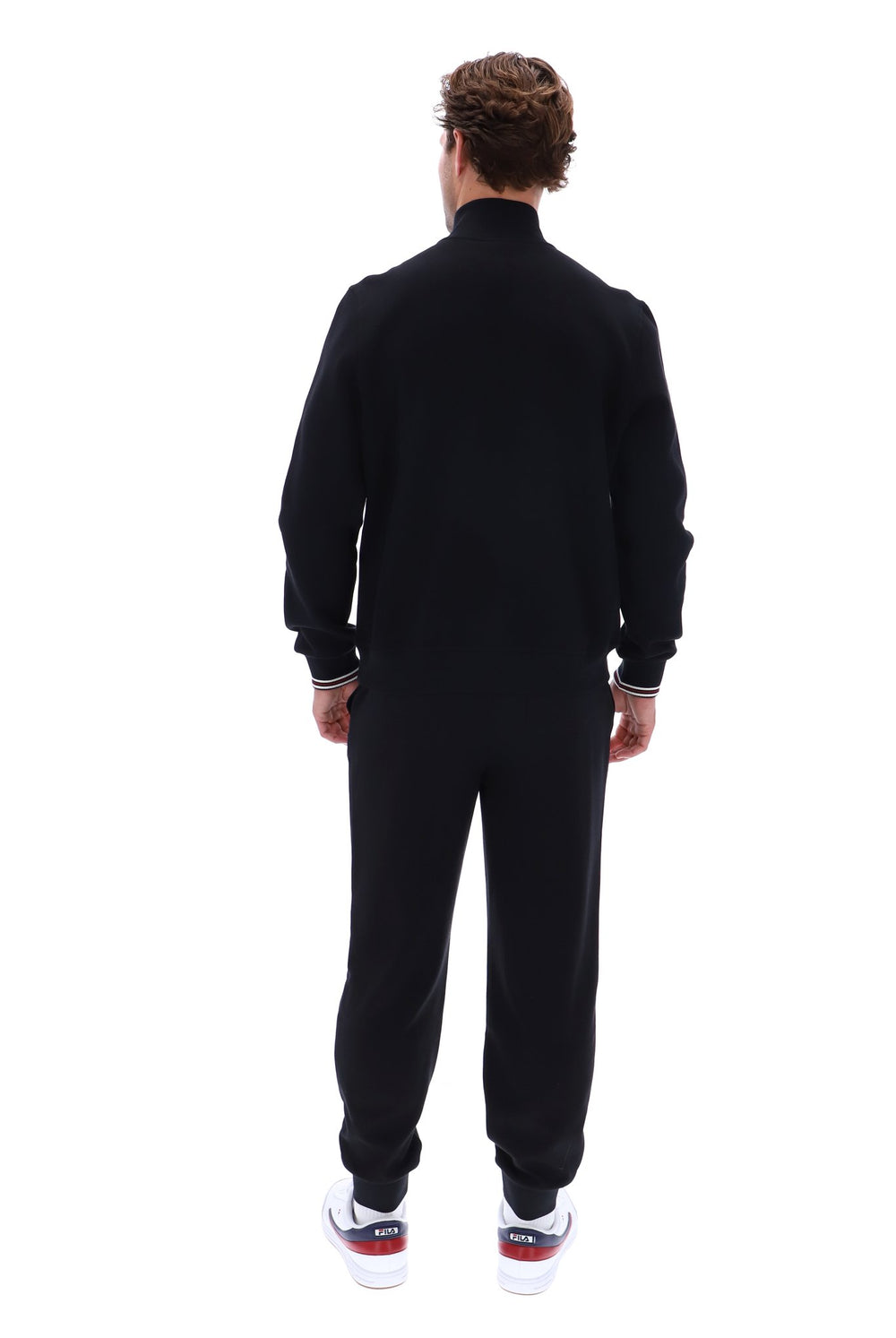 Displays a model wearing the Black 'FILA' branded Ramy F-Box 1/4 Zip