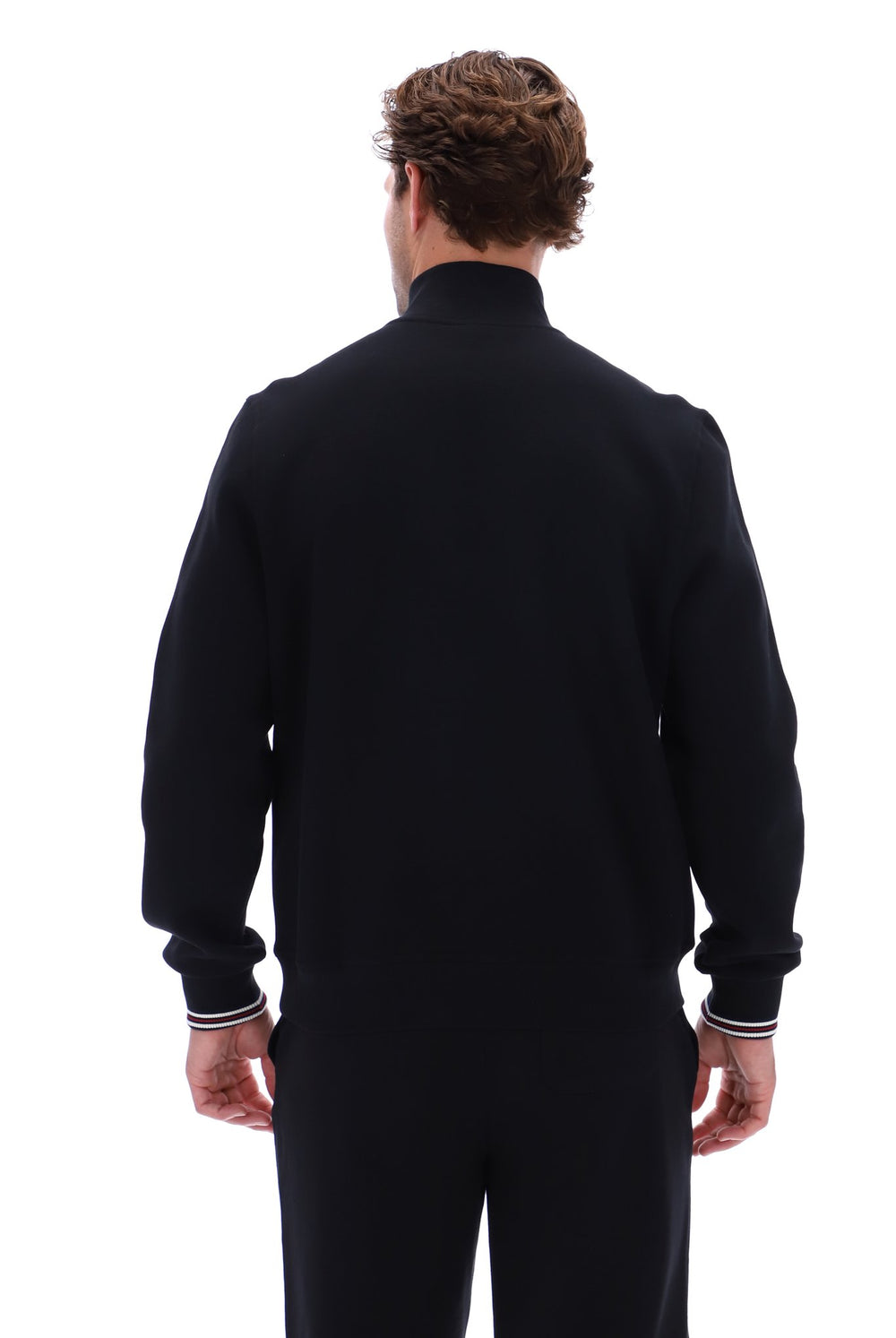 Displays a model wearing the Black 'FILA' branded Ramy F-Box 1/4 Zip