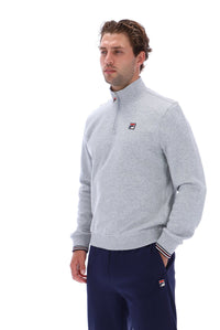 Displays a model wearing the Grey Marl 'FILA' branded Ramy F-Box 1/4 Zip With Yarn Dye Cuff