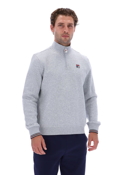 Displays a model wearing the Grey Marl 'FILA' branded Ramy F-Box 1/4 Zip With Yarn Dye Cuff
