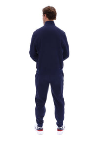Displays a model wearing the 'FILA' branded Navy Ramy F-Box 1/4 Zip Up Jumper