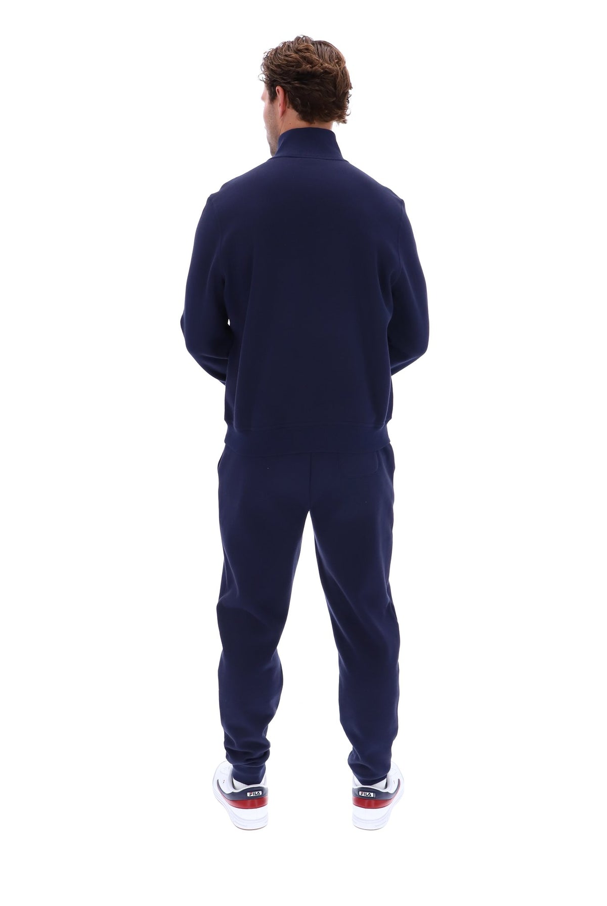 Displays a model wearing the 'FILA' branded Navy Ramy F-Box 1/4 Zip Up Jumper