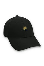 Black cap with a gold FILA logo on a white background