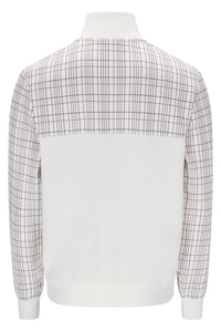 A long-sleeve crewneck sweater displayed on a mannequin, featuring a solid white lower body and a white upper yoke with a thin red and dark gray windowpane plaid pattern across the shoulders and upper sleeves.