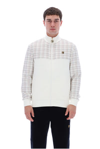 A man wearing a color-blocked zip-up jacket with a white and beige plaid upper chest and sleeves, and a solid white lower body, paired with black pants, against a plain white background.