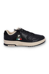 A black FILA low basketball trainer with lace-up closure and the FILA logo on the side.