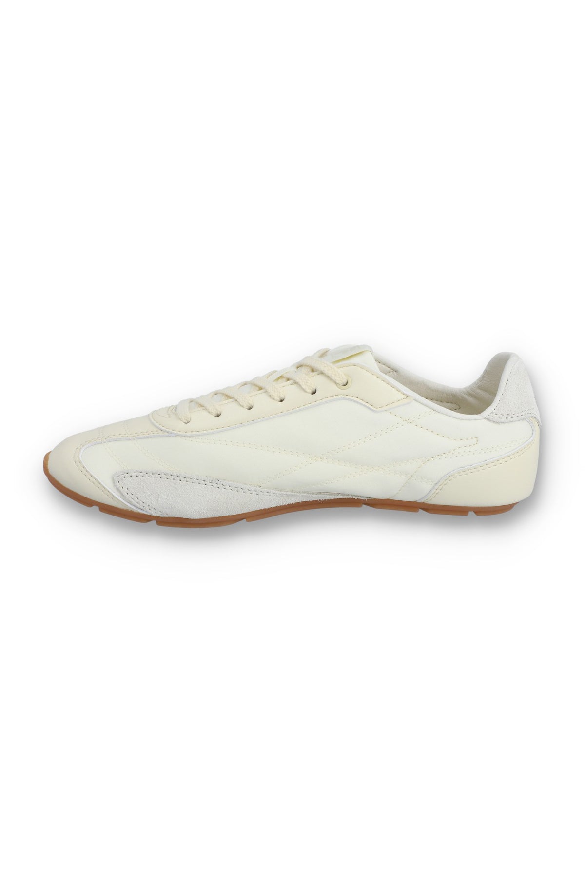 Medial profile view of a FILA Ritmo trainer in off-white nylon, showing the unbranded inner side panel with tonal curved stitching, light grey suede overlays, cream laces, and a slim brown rubber sole against a white background.