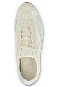 Overhead view of a FILA Ritmo trainer in off-white nylon, showing the flat tonal laces, tongue branding, and a textured cream insole with a subtle logo against a white background.