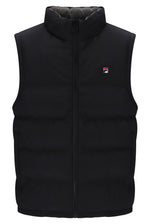 A black sleeveless puffer vest with a high stand-up collar and front zipper, featuring a small red, white, and blue Fila logo on the left chest, shown against a plain white background.