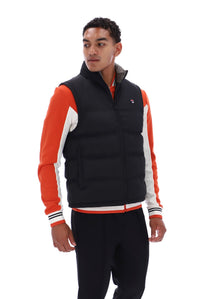 Displays a model wearing the Black/ Gunmetal 'FILA' branded Rodri Gilet