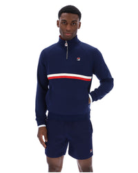 Displays a model wearing the Navy 'Fila' branded Rolando 1/4 Zip Neck Sweatshirt