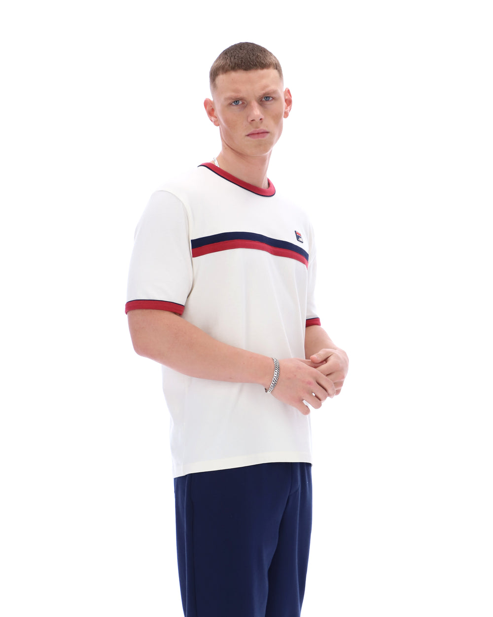 Man wearing a white sports jersey with red and blue stripes on a white background