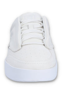 A white suede tennis trainer with low-top design and lace-up closure.
