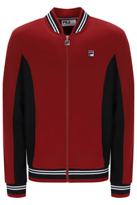 A red and black FILA zip-up track jacket with white and black striped ribbed collar, cuffs, and hem, shown on a plain white background.
