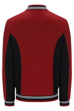 A red and black colorblock knit jacket shown from the back, featuring white and black striped ribbing on the collar, cuffs, and hem.