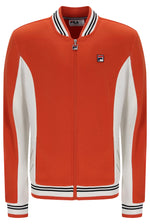 A Fila orange zip-up track jacket with white color-blocked sleeves and collar, featuring black and white striped ribbing on the collar, hem, and cuffs.