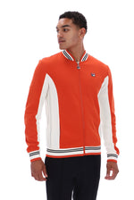 Displays a model wearing the Burnt Ochre 'FILA' branded Settanta Baseball Track Top