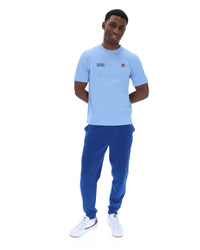 Displays a model wearing the Frozen 'Juicy' branded Fjord Silvio Simple Tee