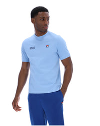 Displays a model wearing the Frozen 'Juicy' branded Fjord Silvio Simple Tee