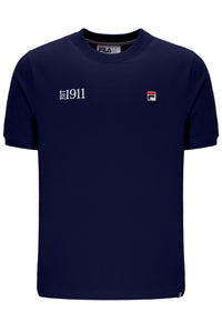 Navy blue t-shirt with a FILA logo on the left side of the chest, and 'EST 1911' text on the right side of the chest against a white background