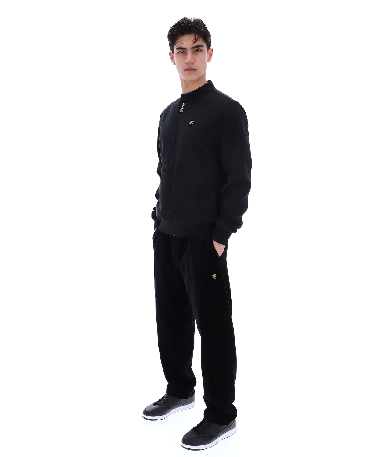 Display a model wearing the Black 'Fila' branded Smith Archive-Inspired Jacket