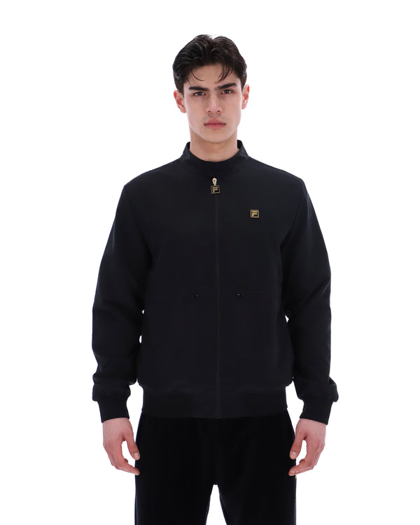 Display a model wearing the Black 'Fila' branded Smith Archive-Inspired Jacket