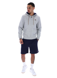 Man wearing a Grey Marl zip-through hoodie with a classic FILA logo on the chest on a white background