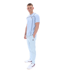 Displays a model wearing the Skyway 'FILA' branded Terri T-Shirt with Contrast Piping