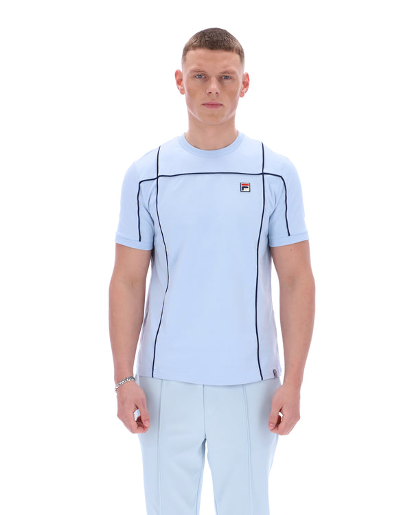 Displays a model wearing the Skyway 'FILA' branded Terri T-Shirt with Contrast Piping