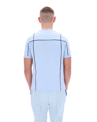 Displays a model wearing the Skyway 'FILA' branded Terri T-Shirt with Contrast Piping
